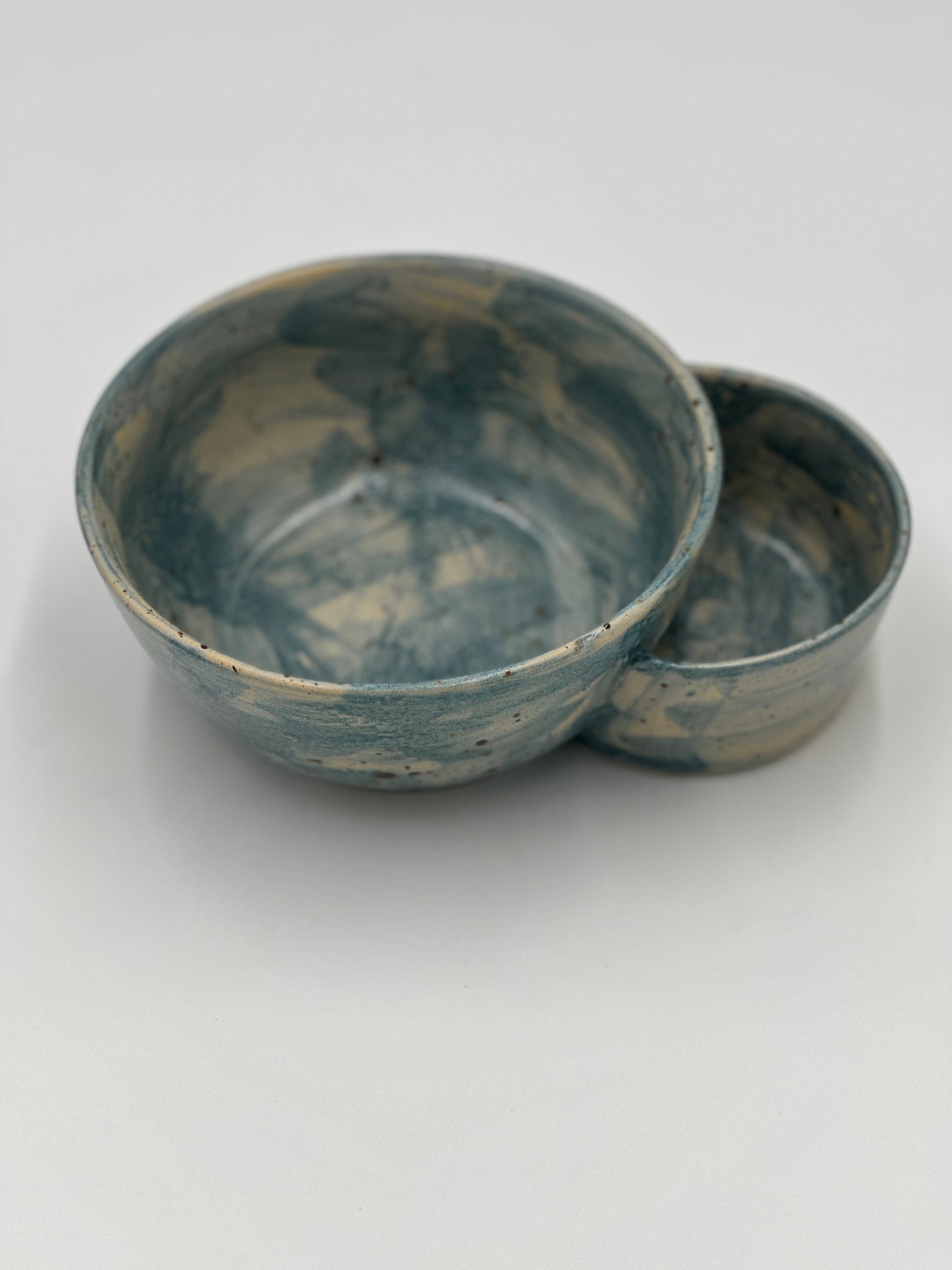 One Gumbo bowl with potato salad bowl attached