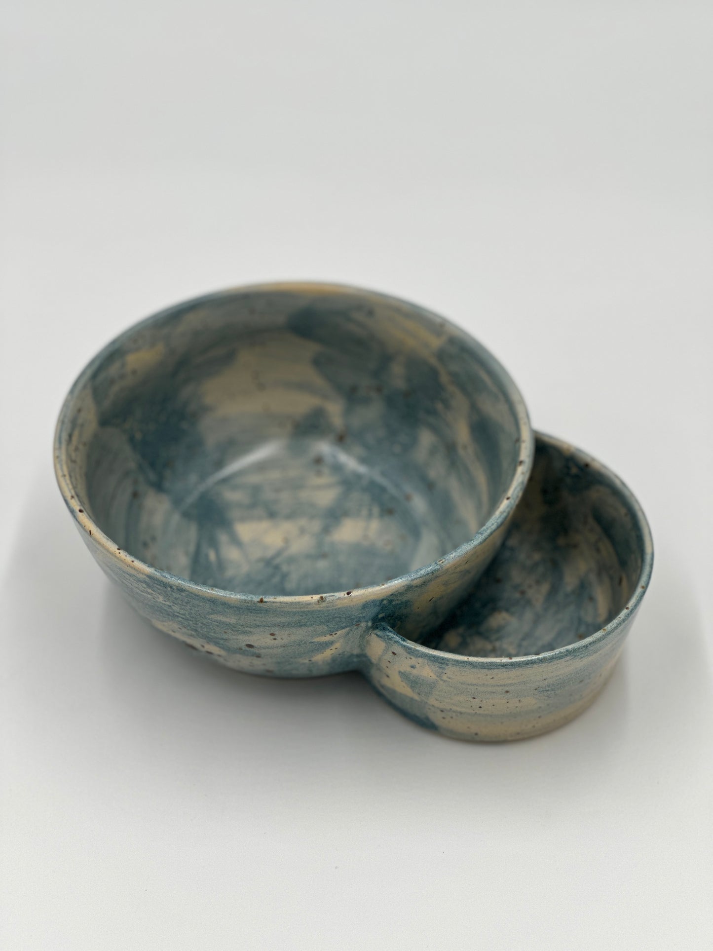 One Gumbo bowl with potato salad bowl attached