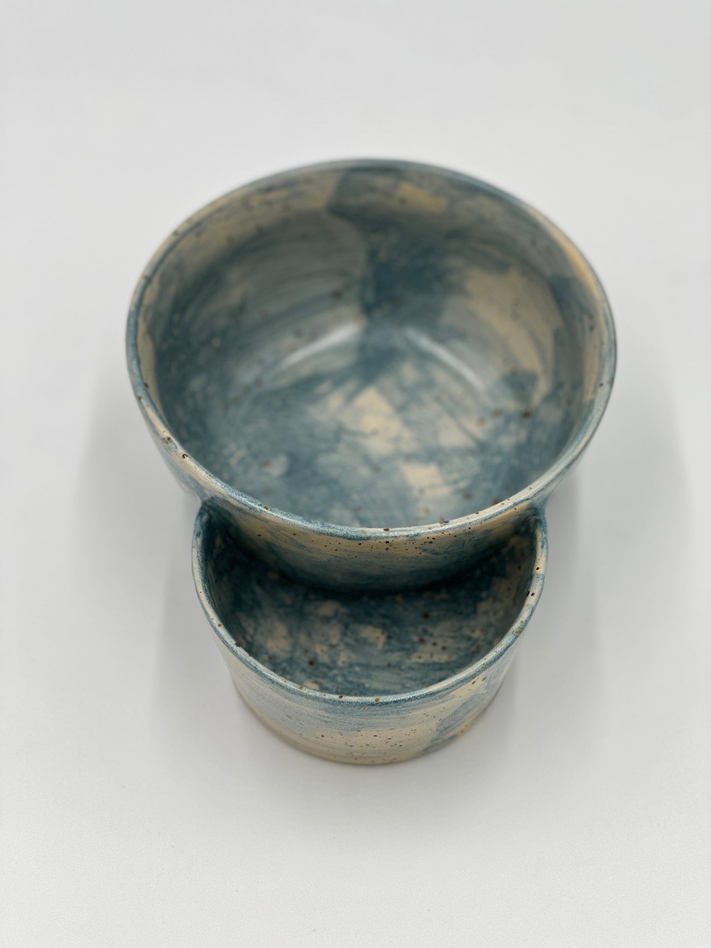 One Gumbo bowl with potato salad bowl attached