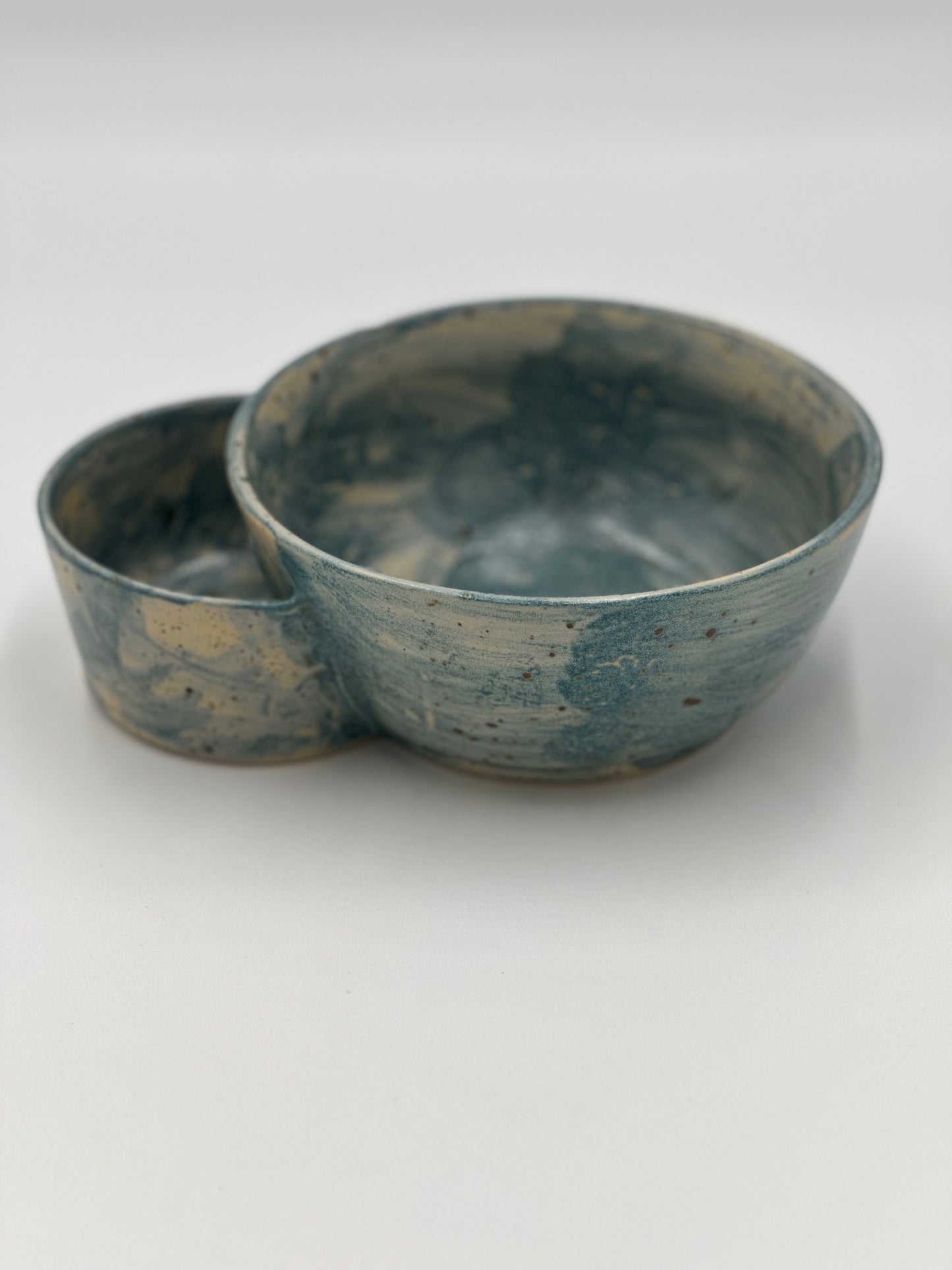 One Gumbo bowl with potato salad bowl attached